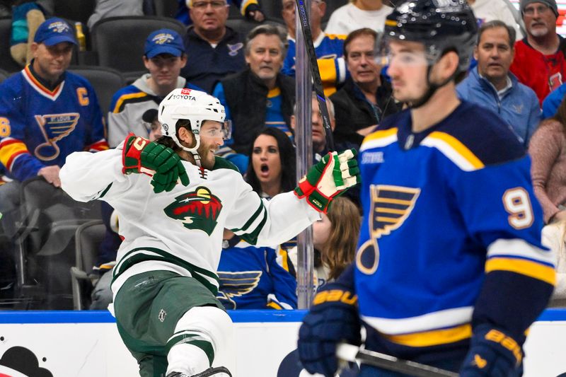 Nov 19, 2024; St. Louis, Missouri, USA;  Minnesota Wild right wing Ryan Hartman (38) reacts after scoring against the St. Louis Blues during the first period at Enterprise Center. Mandatory Credit: Jeff Curry-Imagn Images