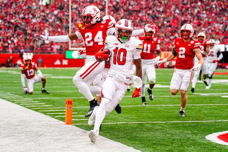 Nov 11, 2023; Lincoln, Nebraska, USA; Maryland Terrapins wide receiver Tai Felton (10) scores a touchdown against the Nebraska Cornhuskers during the second quarter at Memorial Stadium. Mandatory Credit: Dylan Widger-USA TODAY Sports