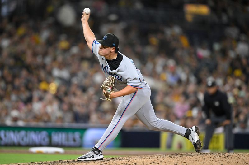 May 27, 2025; San Diego, California, USA; Miami Marlins pitcher Valente Bellozo (83) delivers during the eighth inning against the San Diego Padres at Petco Park. Mandatory Credit: Denis Poroy-Imagn Images