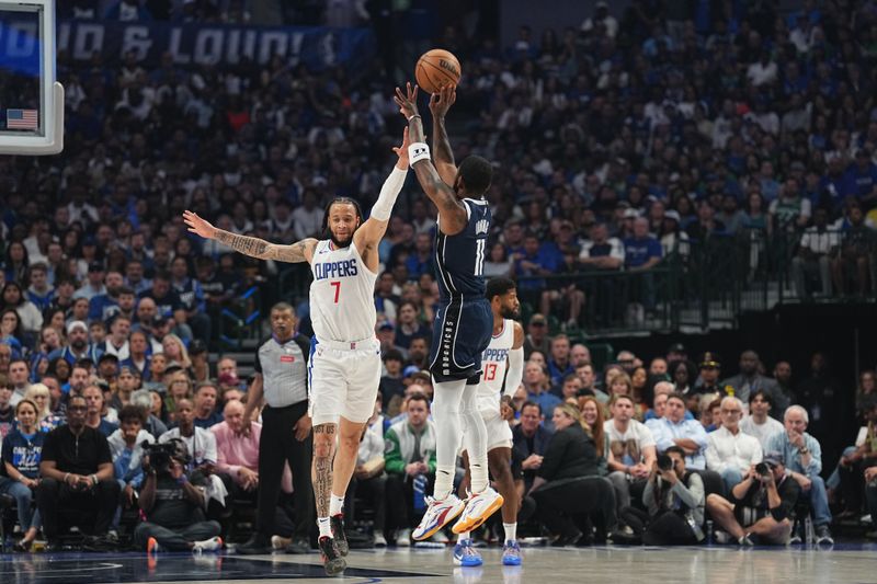 DALLAS, TX - APRIL 28: Kyrie Irving #11 of the Dallas Mavericks shoots the ball during the game against the LA Clippers during Round 1 Game 4 of the 2024 NBA Playoffs on April 28, 2024 at the American Airlines Center in Dallas, Texas. NOTE TO USER: User expressly acknowledges and agrees that, by downloading and or using this photograph, User is consenting to the terms and conditions of the Getty Images License Agreement. Mandatory Copyright Notice: Copyright 2024 NBAE (Photo by Glenn James/NBAE via Getty Images)