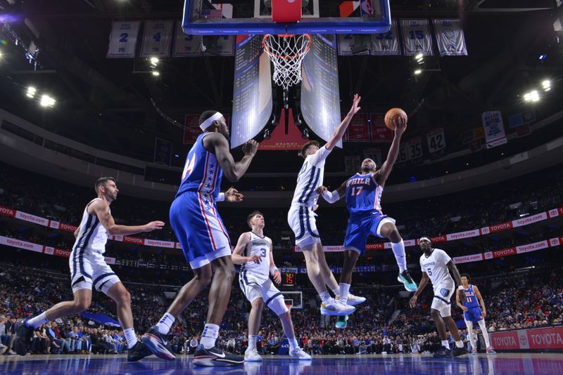 PHILADELPHIA, PA - MARCH 6:  Buddy Heild #17 of the Philadelphia 76ers drives to the basket during the game against the Memphis Grizzlies on March 6, 2024 at the Wells Fargo Center in Philadelphia, Pennsylvania NOTE TO USER: User expressly acknowledges and agrees that, by downloading and/or using this Photograph, user is consenting to the terms and conditions of the Getty Images License Agreement. Mandatory Copyright Notice: Copyright 2024 NBAE (Photo by Jesse D. Garrabrant/NBAE via Getty Images)