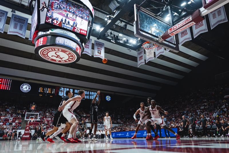 Feb 25, 2025; Tuscaloosa, Alabama, USA; Alabama Crimson Tide forward Grant Nelson (4) shoots a free throw against the Alabama Crimson Tide during the first half at Coleman Coliseum. Mandatory Credit: Will McLelland-Imagn Images