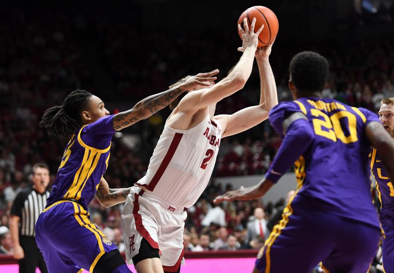 Jan 27, 2024; Tuscaloosa, Alabama, USA;  LSU forward Tyrell Ward (15) fouls Alabama forward Grant Nelson (2) as Nelson attempts to shoot at Coleman Coliseum. Mandatory Credit: Gary Cosby Jr.-USA TODAY Sports