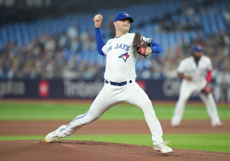 Jun 28, 2023; Toronto, Ontario, CAN; Toronto Blue Jays starting pitcher Trevor Richards (33) throws a pitch against the San Francisco Giants during the first inning at Rogers Centre. Mandatory Credit: Nick Turchiaro-USA TODAY Sports