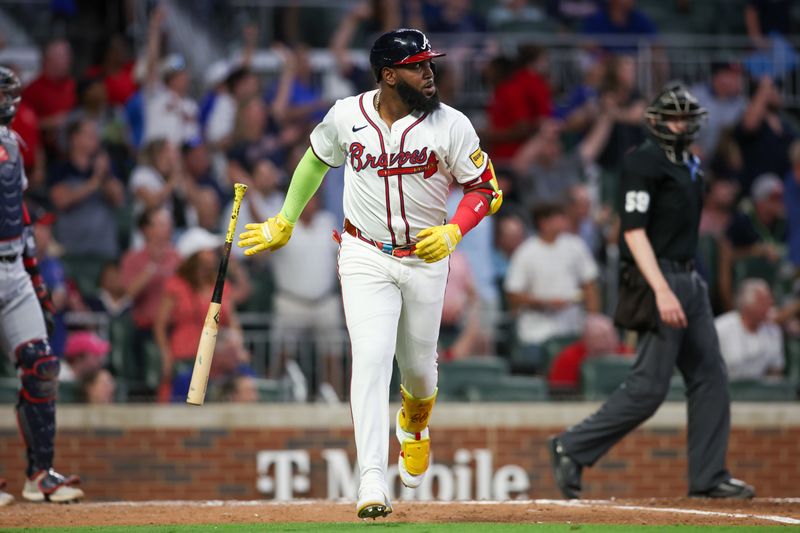 May 28, 2024; Atlanta, Georgia, USA; Atlanta Braves designated hitter Marcell Ozuna (20) hits a home run against the Washington Nationals in the seventh inning at Truist Park. Mandatory Credit: Brett Davis-USA TODAY Sports