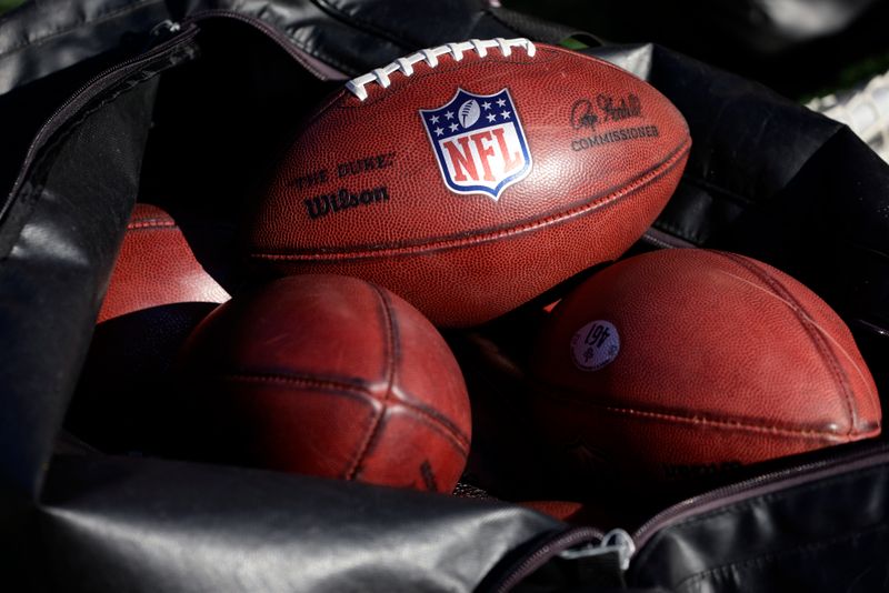 A bag of footballs on the field before an NFL football game between the New Orleans Saints and the Philadelphia Eagles, Sunday, Jan. 1, 2023, in Philadelphia. (AP Photo/Rich Schultz)