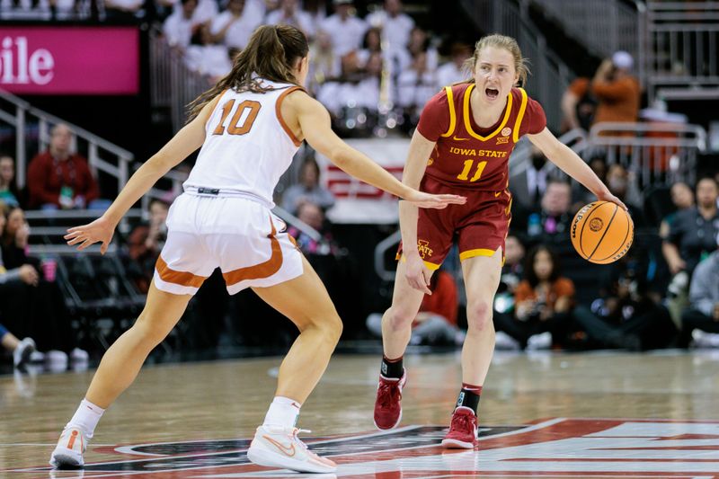 Mar 12, 2024; Kansas City, MO, USA; Iowa State Cyclones guard Emily Ryan (11) brings the ball up court around Texas Longhorns guard Shay Holle (10) during the second half at T-Mobile Center. Mandatory Credit: William Purnell-USA TODAY Sports