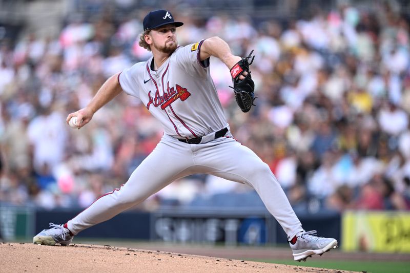 Jul 12, 2024; San Diego, California, USA; Atlanta Braves starting pitcher Spencer Schwellenbach (56) pitches against the San Diego Padres during the first inning at Petco Park. Mandatory Credit: Orlando Ramirez-USA TODAY Sports