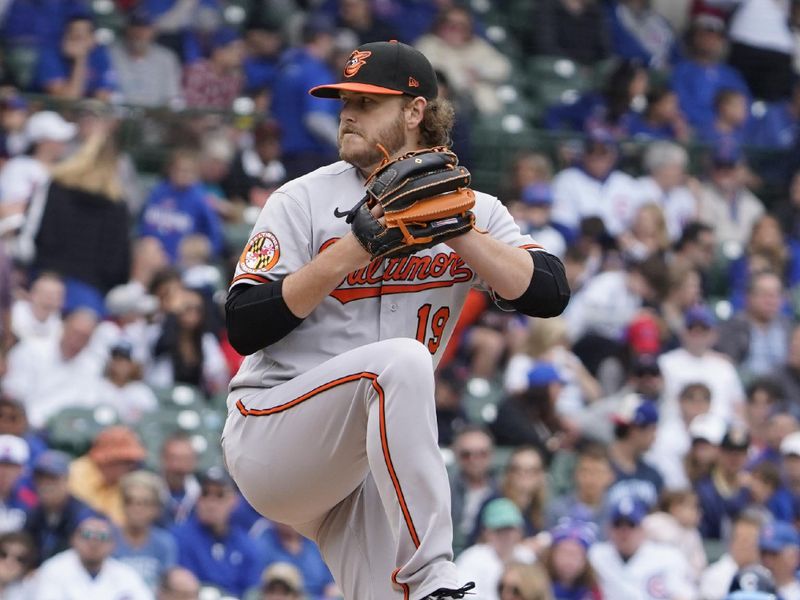 Jun 16, 2023; Chicago, Illinois, USA; Baltimore Orioles starting pitcher Cole Irvin (19) throws the ball against the Chicago Cubs during the first inning at Wrigley Field. Mandatory Credit: David Banks-USA TODAY Sports