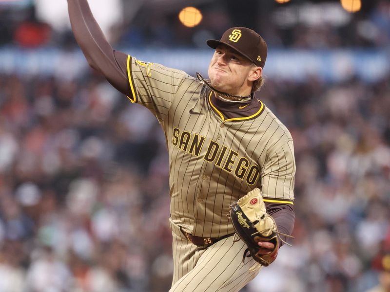 Jun 3, 2025; San Francisco, California, USA;  San Diego Padres relief pitcher Sean Reynolds (25) pitches the ball against the San Francisco Giants during the sixth inning at Oracle Park. Mandatory Credit: Kelley L Cox-Imagn Images
