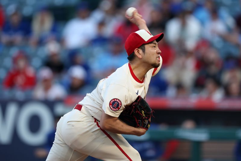 May 7, 2025; Anaheim, California, USA;  Los Angeles Angels starting pitcher Yusei Kikuchi (16) pitches during the second inning against the Toronto Blue Jays at Angel Stadium. Mandatory Credit: Kiyoshi Mio-Imagn Images