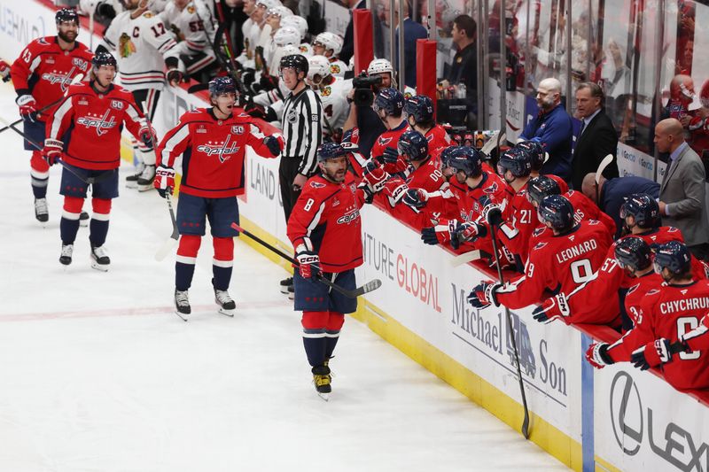 Apr 4, 2025; Washington, District of Columbia, USA; Washington Capitals left wing Alex Ovechkin (8) celebrates with players on the bench after scoring a goal against the Chicago Blackhawks during the first period at Capital One Arena. Mandatory Credit: Amber Searls-Imagn Images
