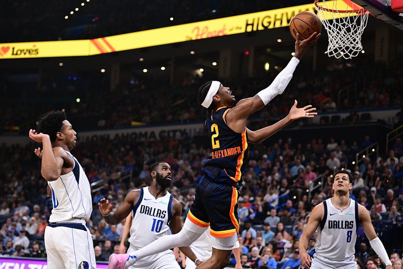 OKLAHOMA CITY, OKLAHOMA - APRIL 14: Shai Gilgeous-Alexander #2 of the Oklahoma City Thunder goes to the rim during the first half against the Dallas Mavericks at Paycom Center on April 14, 2024 in Oklahoma City, Oklahoma. NOTE TO USER: User expressly acknowledges and agrees that, by downloading and or using this Photograph, user is consenting to the terms and conditions of the Getty Images License Agreement. (Photo by Joshua Gateley/Getty Images)