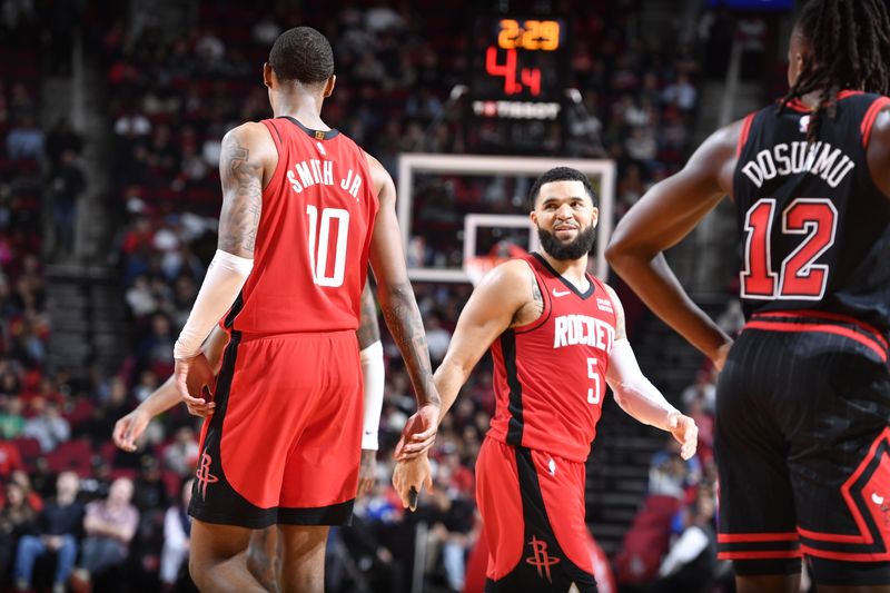 HOUSTON, TX - MARCH 21:   Fred VanVleet #5 of the Houston Rockets looks on during the game against the Chicago Bulls on March 21, 2024 at the Toyota Center in Houston, Texas. NOTE TO USER: User expressly acknowledges and agrees that, by downloading and or using this photograph, User is consenting to the terms and conditions of the Getty Images License Agreement. Mandatory Copyright Notice: Copyright 2024 NBAE (Photo by Logan Riely/NBAE via Getty Images)