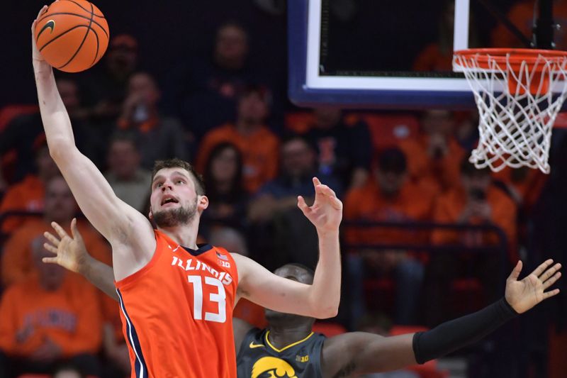 Feb 25, 2025; Champaign, Illinois, USA;  Illinois Fighting Illini center Tomislav Ivisic (13) grabs a pass during the second half against the Iowa Hawkeyes at State Farm Center. Mandatory Credit: Ron Johnson-Imagn Images