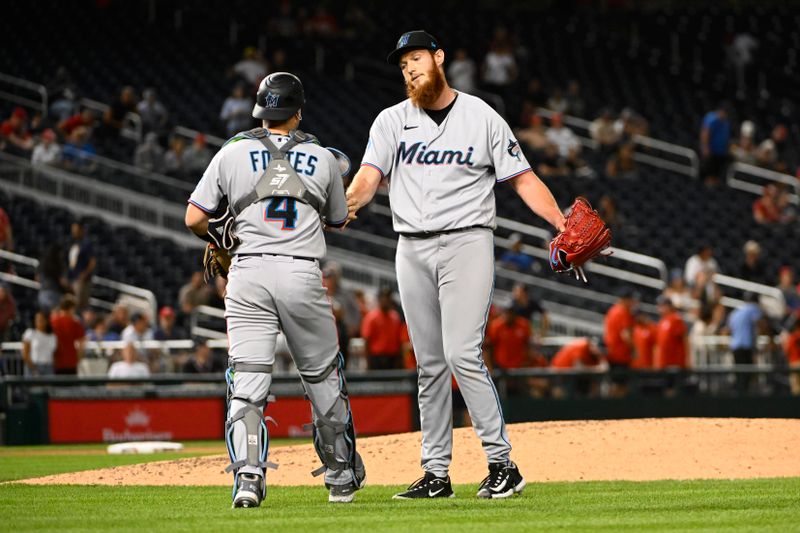 Aug 31, 2023; Washington, District of Columbia, USA; Miami Marlins relief pitcher A.J. Puk (35) is congratulated by catcher Nick Fortes (4) after the game against the Washington Nationals  at Nationals Park. Mandatory Credit: Brad Mills-USA TODAY Sports