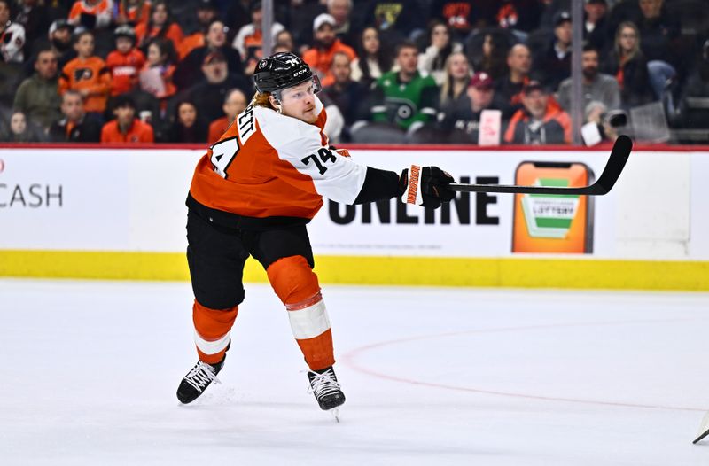 Mar 12, 2024; Philadelphia, Pennsylvania, USA; Philadelphia Flyers right wing Owen Tippett (74) shoots against the San Jose Sharks in the first period at Wells Fargo Center. Mandatory Credit: Kyle Ross-USA TODAY Sports