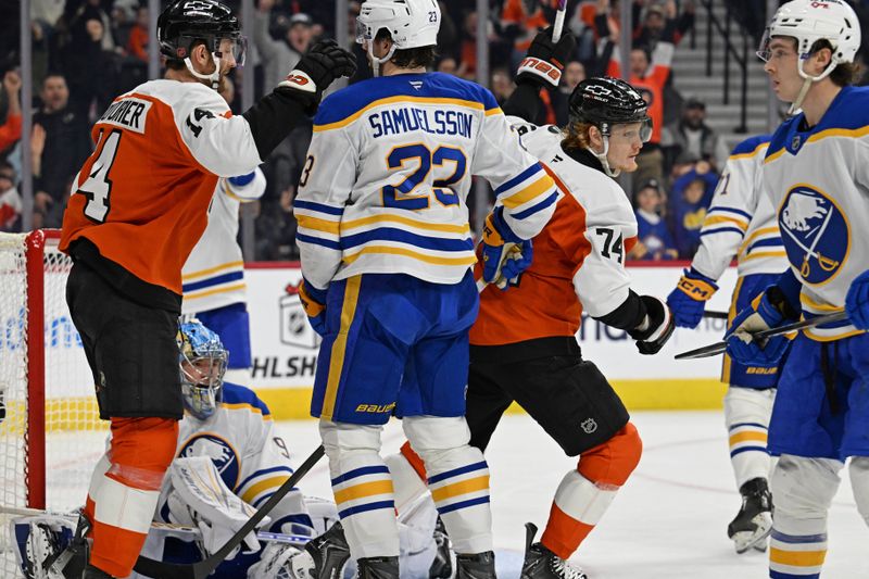 Dec 3, 2025; Philadelphia, Pennsylvania, USA;  Philadelphia Flyers right wing Owen Tippett (74) celebrates his goal against the Buffalo Sabres during the second period at Xfinity Mobile Arena. Mandatory Credit: Eric Hartline-Imagn Images