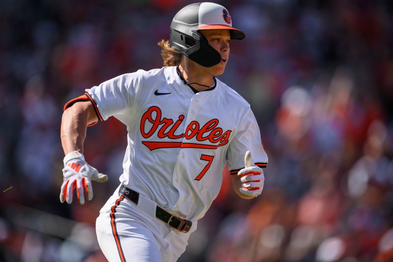 Apr 14, 2024; Baltimore, Maryland, USA; Baltimore Orioles second base Jackson Holliday (7) runs to first base after hitting a single during the seventh inning against the Milwaukee Brewers at Oriole Park at Camden Yards. Mandatory Credit: Reggie Hildred-USA TODAY Sports