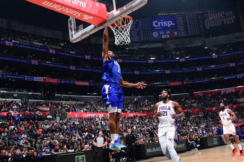 LOS ANGELES, CA - JANUARY 17: Kawhi Leonard #2 of the LA Clippers drives to the basket during the game against the Philadelphia 76ers on January 17, 2023 at Crypto.Com Arena in Los Angeles, California. NOTE TO USER: User expressly acknowledges and agrees that, by downloading and/or using this Photograph, user is consenting to the terms and conditions of the Getty Images License Agreement. Mandatory Copyright Notice: Copyright 2023 NBAE (Photo by Adam Pantozzi/NBAE via Getty Images)