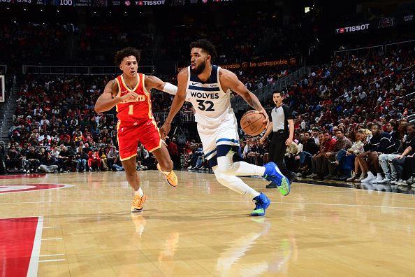 ATLANTA, GA - OCTOBER 30: Karl-Anthony Towns #32 of the Minnesota Timberwolves drives to the basket during the game against the Atlanta Hawks on October 30, 2023 at State Farm Arena in Atlanta, Georgia.  NOTE TO USER: User expressly acknowledges and agrees that, by downloading and/or using this Photograph, user is consenting to the terms and conditions of the Getty Images License Agreement. Mandatory Copyright Notice: Copyright 2023 NBAE (Photo by Scott Cunningham/NBAE via Getty Images)