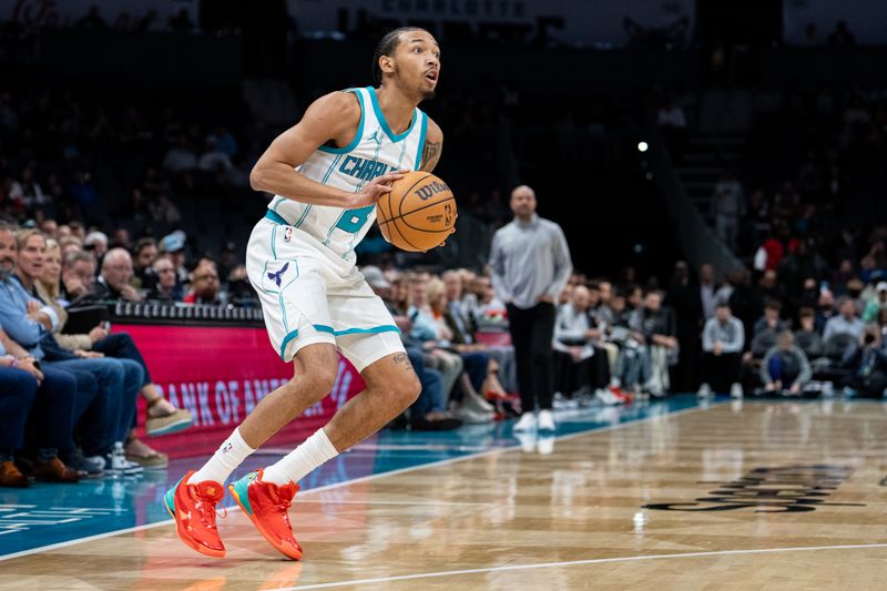 CHARLOTTE, NORTH CAROLINA - JANUARY 29: Nick Smith Jr. #8 of the Charlotte Hornets looks to shoot in the first quarter against the Brooklyn Nets at Spectrum Center on January 29, 2025 in Charlotte, North Carolina. NOTE TO USER: User expressly acknowledges and agrees that, by downloading and or using this photograph, User is consenting to the terms and conditions of the Getty Images License Agreement. (Photo by Jacob Kupferman/Getty Images)