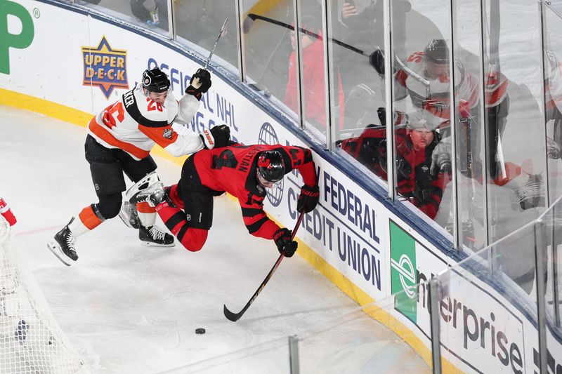 Feb 17, 2024; East Rutherford, New Jersey, USA; New Jersey Devils right wing Nathan Bastian (14) is checked by Philadelphia Flyers defenseman Sean Walker (26) during the third period in a Stadium Series ice hockey game at MetLife Stadium. Mandatory Credit: Vincent Carchietta-USA TODAY Sports