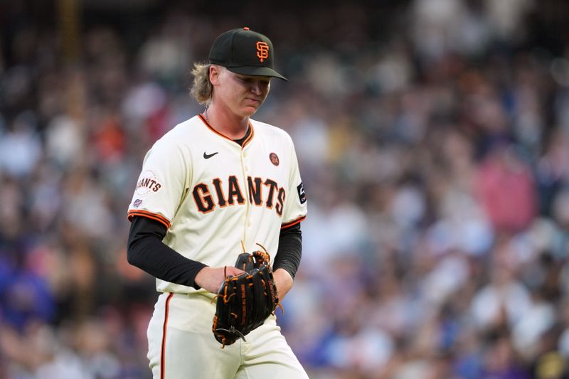 Jun 26, 2024; San Francisco, California, USA; San Francisco Giants starting pitcher Hayden Birdsong (60) walks to the dugout after being removed from the game during the fifth inning against the Chicago Cubs at Oracle Park. Mandatory Credit: Darren Yamashita-USA TODAY Sports