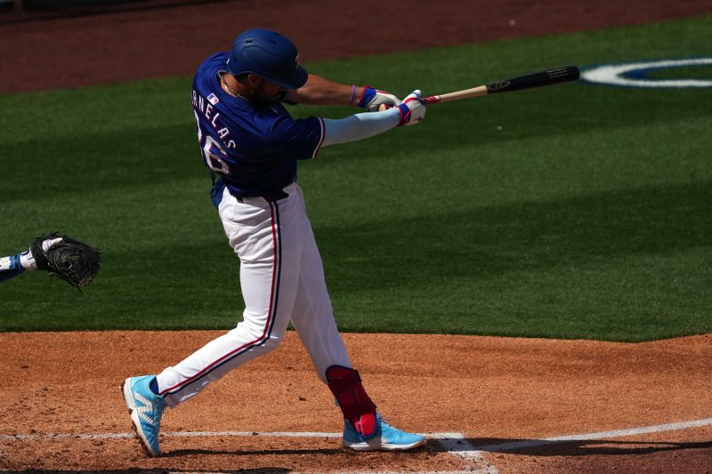 Feb 28, 2024; Surprise, Arizona, USA; Texas Rangers third baseman Jonathan Ornelas (36) bats against the Los Angeles Dodgers during the third inning at Surprise Stadium. Mandatory Credit: Joe Camporeale-USA TODAY Sports