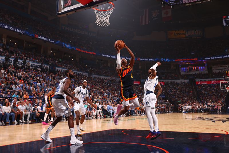 OKLAHOMA CITY, OK - APRIL 14:  Shai Gilgeous-Alexander #2 of the Oklahoma City Thunder shoots the ball during the game against the Dallas Mavericks on April 14, 2024 at Paycom Arena in Oklahoma City, Oklahoma. NOTE TO USER: User expressly acknowledges and agrees that, by downloading and or using this photograph, User is consenting to the terms and conditions of the Getty Images License Agreement. Mandatory Copyright Notice: Copyright 2024 NBAE (Photo by Zach Beeker/NBAE via Getty Images)