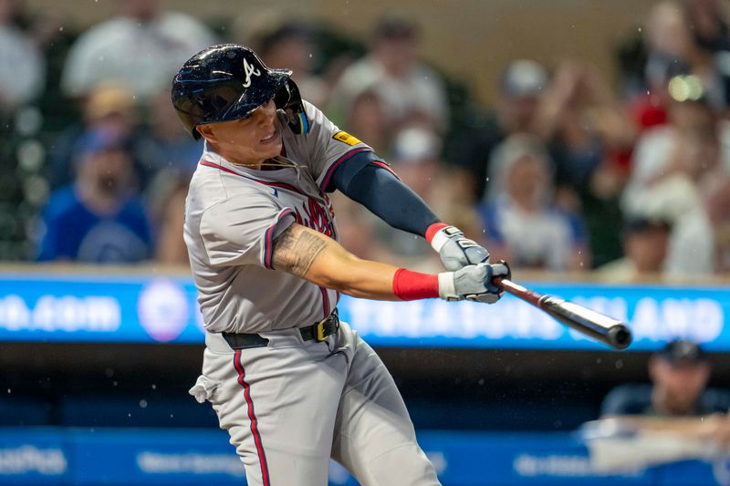 Aug 26, 2024; Minneapolis, Minnesota, USA; Atlanta Braves third baseman Gio Urshela (9) hits a single against the Minnesota Twins in the third inning at Target Field. Mandatory Credit: Jesse Johnson-USA TODAY Sports