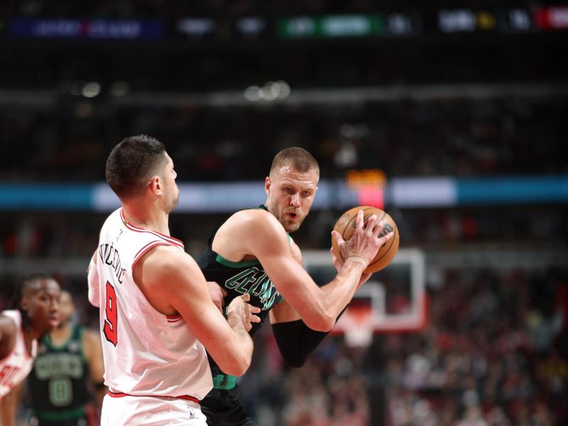 CHICAGO, IL - FEBRUARY 22: Kristaps Porzingis #8 of the Boston Celtics handles the ball during the game against the Chicago Bulls on February 22, 2024 at United Center in Chicago, Illinois. NOTE TO USER: User expressly acknowledges and agrees that, by downloading and or using this photograph, User is consenting to the terms and conditions of the Getty Images License Agreement. Mandatory Copyright Notice: Copyright 2024 NBAE (Photo by Jeff Haynes/NBAE via Getty Images)