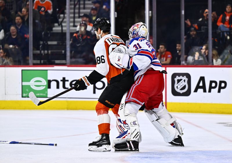 Feb 24, 2024; Philadelphia, Pennsylvania, USA; New York Rangers goalie Igor Shesterkin (31) hits Philadelphia Flyers left wing Joel Farabee (86) after losing his stick in the first period at Wells Fargo Center. Mandatory Credit: Kyle Ross-USA TODAY Sports