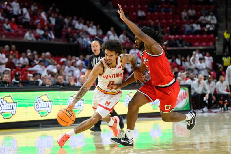 Dec 4, 2024; College Park, Maryland, USA; Maryland Terrapins guard Ja'Kobi Gillespie (0) drives to the basket against Ohio State Buckeyes guard Bruce Thornton (2) during the second half at Xfinity Center. Mandatory Credit: Reggie Hildred-Imagn Images