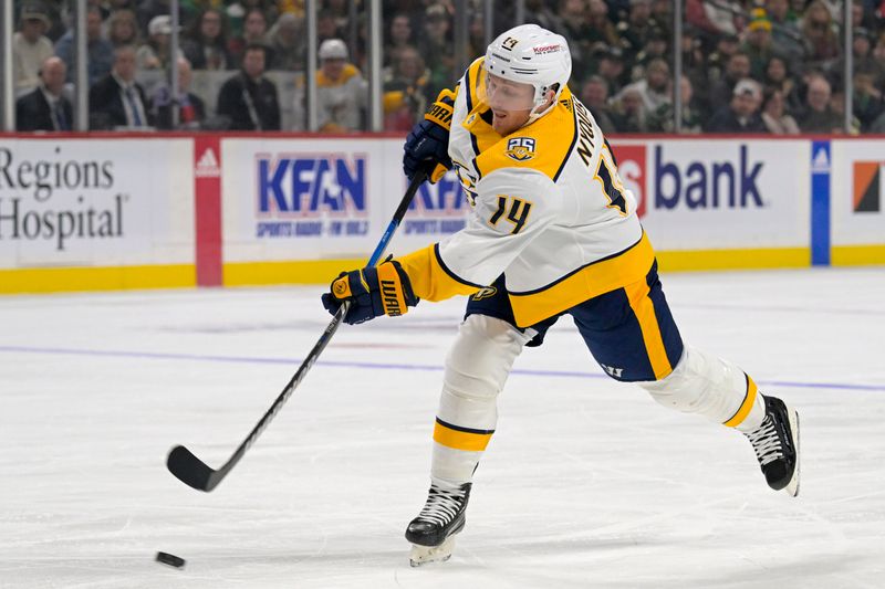 Mar 10, 2024; Saint Paul, Minnesota, USA;  Nashville Predators forward Gustav Nyquist (14) takes a shot on goal against the Minnesota Wild during the first period at Xcel Energy Center. Mandatory Credit: Nick Wosika-USA TODAY Sports

