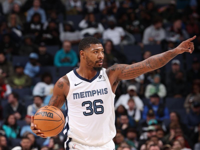 MEMPHIS, TN - DECEMBER 5: Marcus Smart #36 of the Memphis Grizzlies dribbles the ball during the game against the Sacramento Kings on December 5, 2024 at FedExForum in Memphis, Tennessee. NOTE TO USER: User expressly acknowledges and agrees that, by downloading and or using this photograph, User is consenting to the terms and conditions of the Getty Images License Agreement. Mandatory Copyright Notice: Copyright 2024 NBAE (Photo by Joe Murphy/NBAE via Getty Images)