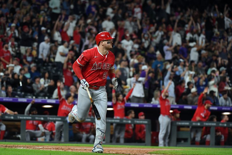 Sep 20, 2025; Denver, Colorado, USA; Los Angeles Angels designated hitter Mike Trout (27) watches after hitting his 400th career home run during the eighth inning against the Colorado Rockies at Coors Field. Mandatory Credit: Christopher Hanewinckel-Imagn Images