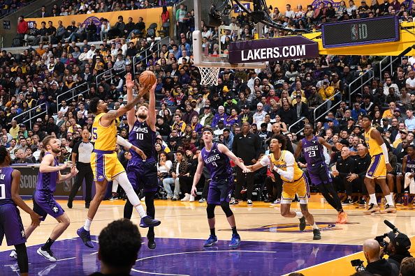 LOS ANGELES, CA - NOVEMBER 15: Christian Wood #35 of the Los Angeles Lakers drives to the basket during the game against the Sacramento Kings on November 15, 2023 at Crypto.Com Arena in Los Angeles, California. NOTE TO USER: User expressly acknowledges and agrees that, by downloading and/or using this Photograph, user is consenting to the terms and conditions of the Getty Images License Agreement. Mandatory Copyright Notice: Copyright 2023 NBAE (Photo by Adam Pantozzi/NBAE via Getty Images)