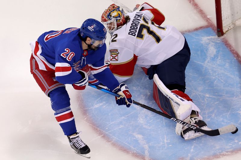May 30, 2024; New York, New York, USA; New York Rangers left wing Chris Kreider (20) scores a short handed goal against Florida Panthers goaltender Sergei Bobrovsky (72) during the second period of game five of the Eastern Conference Final of the 2024 Stanley Cup Playoffs at Madison Square Garden. Mandatory Credit: Brad Penner-USA TODAY Sports