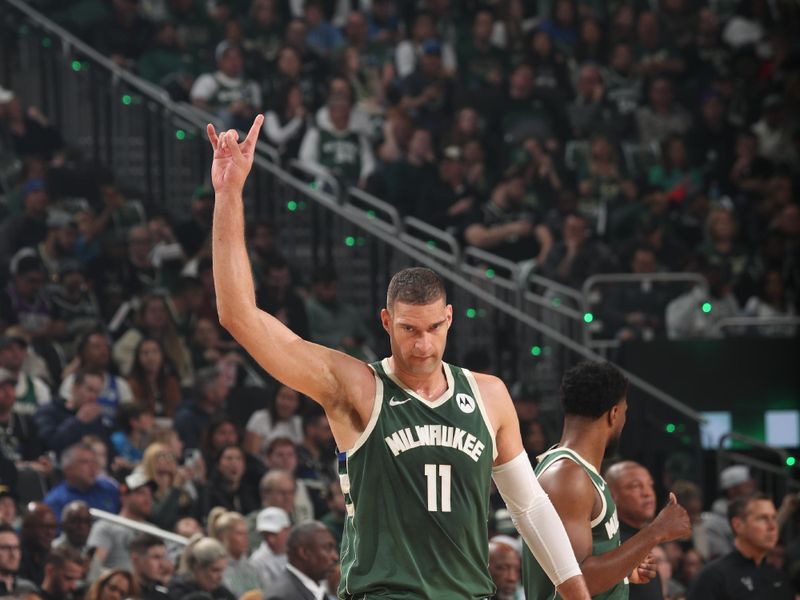 MILWAUKEE, WI - APRIL 21: Brook Lopez #11 of the Milwaukee Bucks celebrates during the game against the Indiana Pacers during Round 1 Game 1 of the 2024 NBA Playoffs on April 21, 2024 at the Fiserv Forum Center in Milwaukee, Wisconsin. NOTE TO USER: User expressly acknowledges and agrees that, by downloading and or using this Photograph, user is consenting to the terms and conditions of the Getty Images License Agreement. Mandatory Copyright Notice: Copyright 2024 NBAE (Photo by Gary Dineen/NBAE via Getty Images).