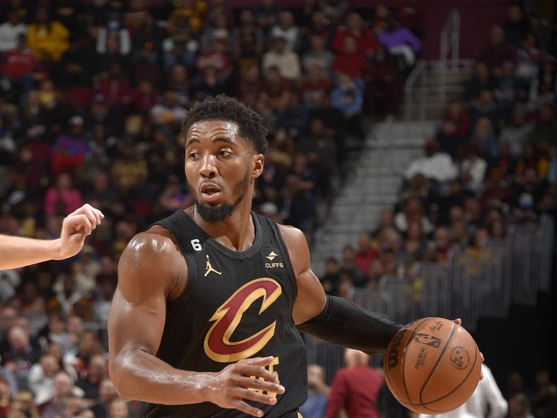 CLEVELAND, OH - DECEMBER 6: Donovan Mitchell #45 of the Cleveland Cavaliers dribbles the ball during the game against the Los Angeles Lakers on December 6, 2022 at Rocket Mortgage FieldHouse in Cleveland, Ohio. NOTE TO USER: User expressly acknowledges and agrees that, by downloading and/or using this Photograph, user is consenting to the terms and conditions of the Getty Images License Agreement. Mandatory Copyright Notice: Copyright 2022 NBAE (Photo by David Liam Kyle/NBAE via Getty Images)