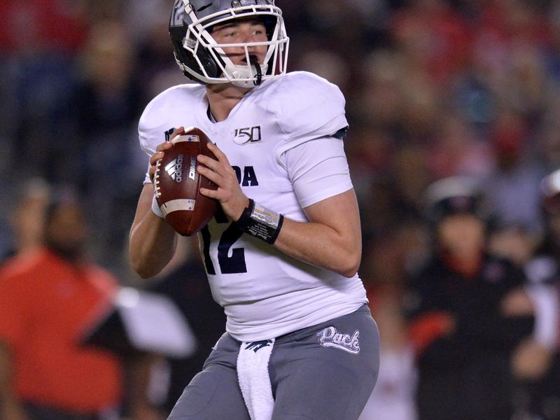 Nov 9, 2019; San Diego, CA, USA; Nevada Wolf Pack quarterback Carson Strong (12) looks to pass during the first quarter against the San Diego State Aztecs at SDCCU Stadium. Mandatory Credit: Jake Roth-USA TODAY Sports