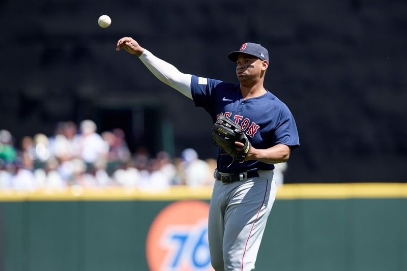 Aug 2, 2023; Seattle, Washington, USA; Boston Red Sox third baseman Rafael Devers warms up before playing the Seattle Mariners at T-Mobile Park. Mandatory Credit: John Froschauer-USA TODAY Sports