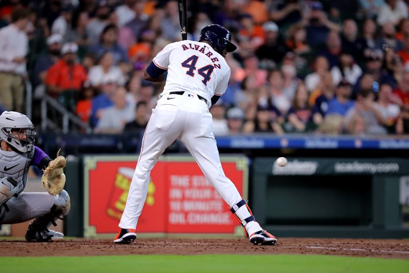 Jun 26, 2024; Houston, Texas, USA; Houston Astros left fielder Yordan Alvarez (44) is hit by a pitch against the Colorado Rockies during the fourth inning at Minute Maid Park. Mandatory Credit: Erik Williams-USA TODAY Sports