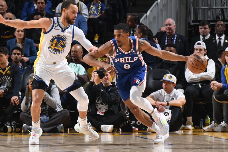 SAN FRANCISCO, CA - MARCH 24: De'Anthony Melton #8 of the Philadelphia 76ers dribbles the ball during the game against the Golden State Warriors on March 24, 2023 at Chase Center in San Francisco, California. NOTE TO USER: User expressly acknowledges and agrees that, by downloading and or using this photograph, user is consenting to the terms and conditions of Getty Images License Agreement. Mandatory Copyright Notice: Copyright 2023 NBAE (Photo by Noah Graham/NBAE via Getty Images)