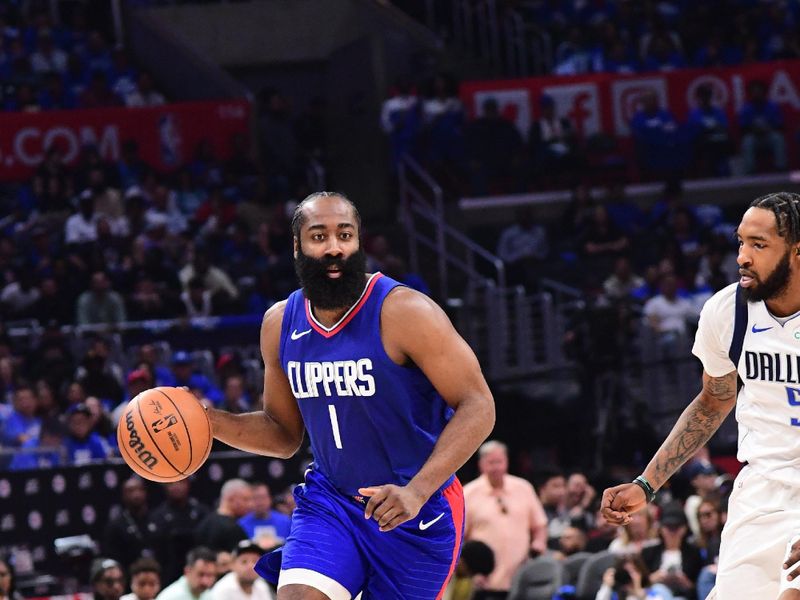 LOS ANGELES, CA - APRIL 21:  James Harden #1 of the LA Clippers handles the ball during the game against the Dallas Mavericks during Round 1 Game 1 of the 2024 NBA Playoffs on April 21, 2024 at Crypto.Com Arena in Los Angeles, California. NOTE TO USER: User expressly acknowledges and agrees that, by downloading and/or using this Photograph, user is consenting to the terms and conditions of the Getty Images License Agreement. Mandatory Copyright Notice: Copyright 2024 NBAE (Photo by Adam Pantozzi/NBAE via Getty Images)