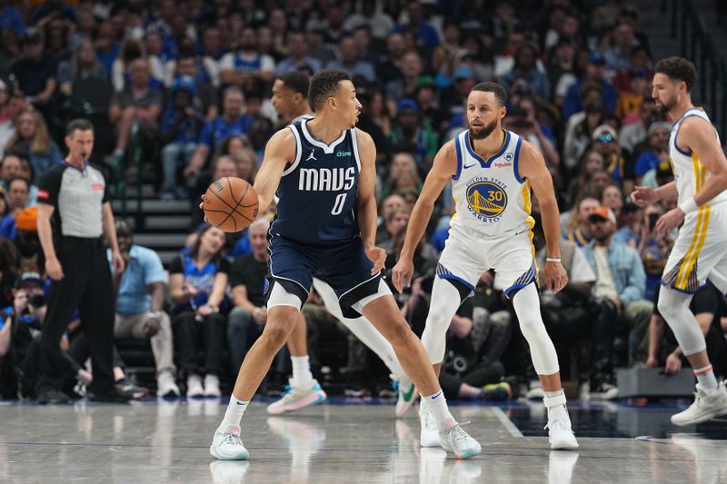 DALLAS, TX - APRIL 5: Dante Exum #0 of the Dallas Mavericks handles the ball during the game against the Golden State Warriors on April 5, 2024 at the American Airlines Center in Dallas, Texas. NOTE TO USER: User expressly acknowledges and agrees that, by downloading and or using this photograph, User is consenting to the terms and conditions of the Getty Images License Agreement. Mandatory Copyright Notice: Copyright 2024 NBAE (Photo by Glenn James/NBAE via Getty Images)