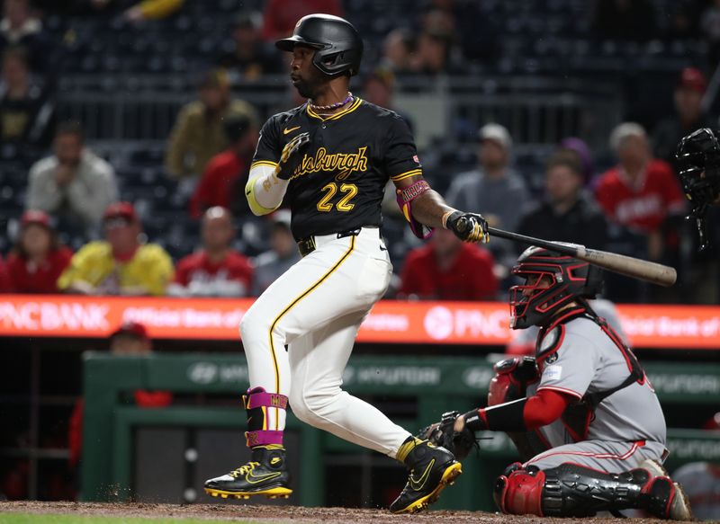 May 20, 2025; Pittsburgh, Pennsylvania, USA; Pittsburgh Pirates designated hitter Andrew McCutchen (22) hits a single against the Cincinnati Reds during the eighth inning at PNC Park. Mandatory Credit: Charles LeClaire-Imagn Images