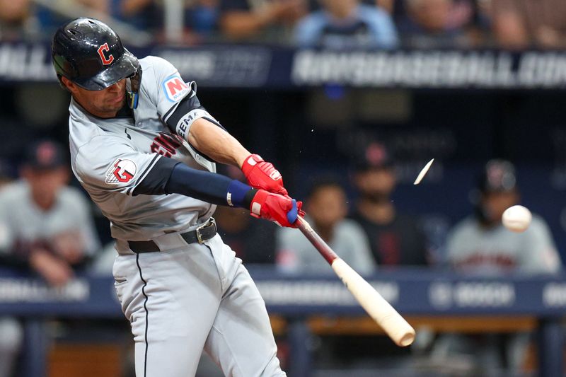 Jul 13, 2024; St. Petersburg, Florida, USA; Cleveland Guardians outfielder Tyler Freeman (2) breaks his bat on a single against the Tampa Bay Rays in the eighth inning at Tropicana Field. Mandatory Credit: Nathan Ray Seebeck-USA TODAY Sports