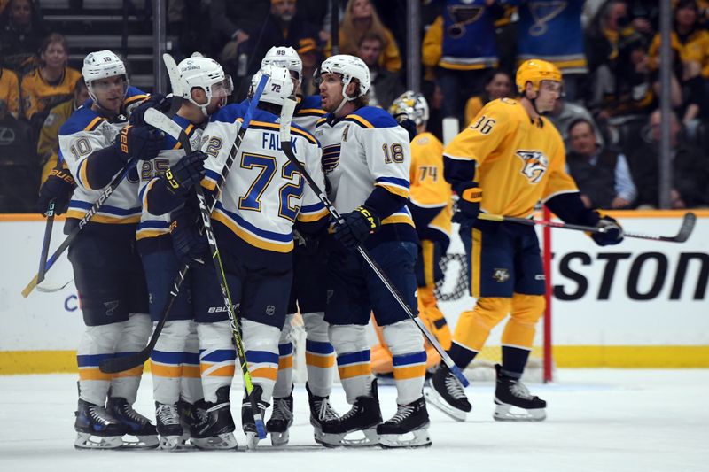 Apr 4, 2024; Nashville, Tennessee, USA; St. Louis Blues center Jordan Kyrou (25) celebrates with teammates after a goal during the third period against the Nashville Predators at Bridgestone Arena. Mandatory Credit: Christopher Hanewinckel-USA TODAY Sports